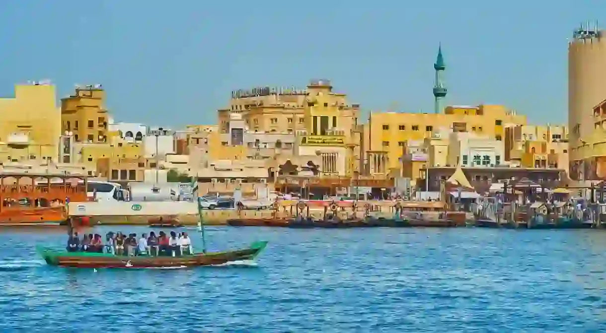 Hop on a traditional abra (water taxi) on Dubai Creek for a sightseeing tour of Bur Dubais busy waterway