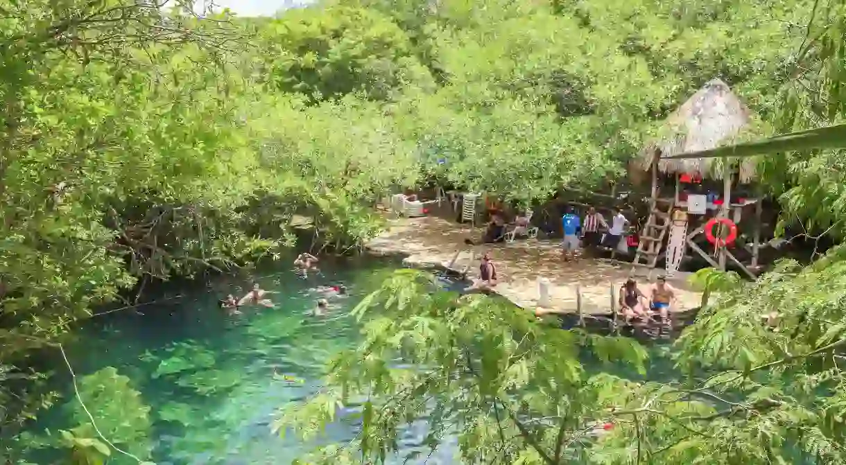 Take a cooling dip in Cenote Cristalino, Tulum