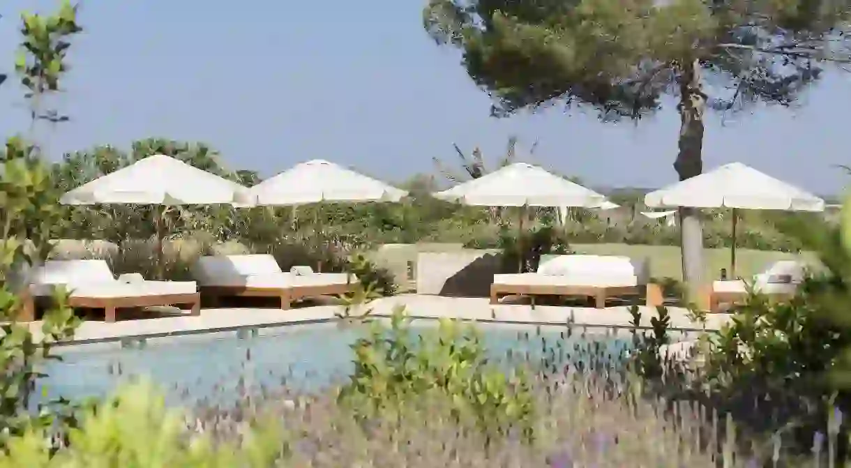 Unwind by the pool at the family-run Fontsanta Hotel on Mallorca, Spain