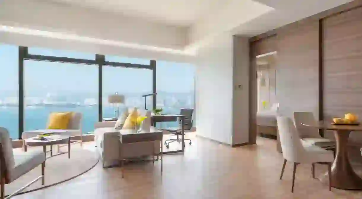 Enjoy stunning views from rooms with large windows at the Island Pacific Hotel in Hong Kong