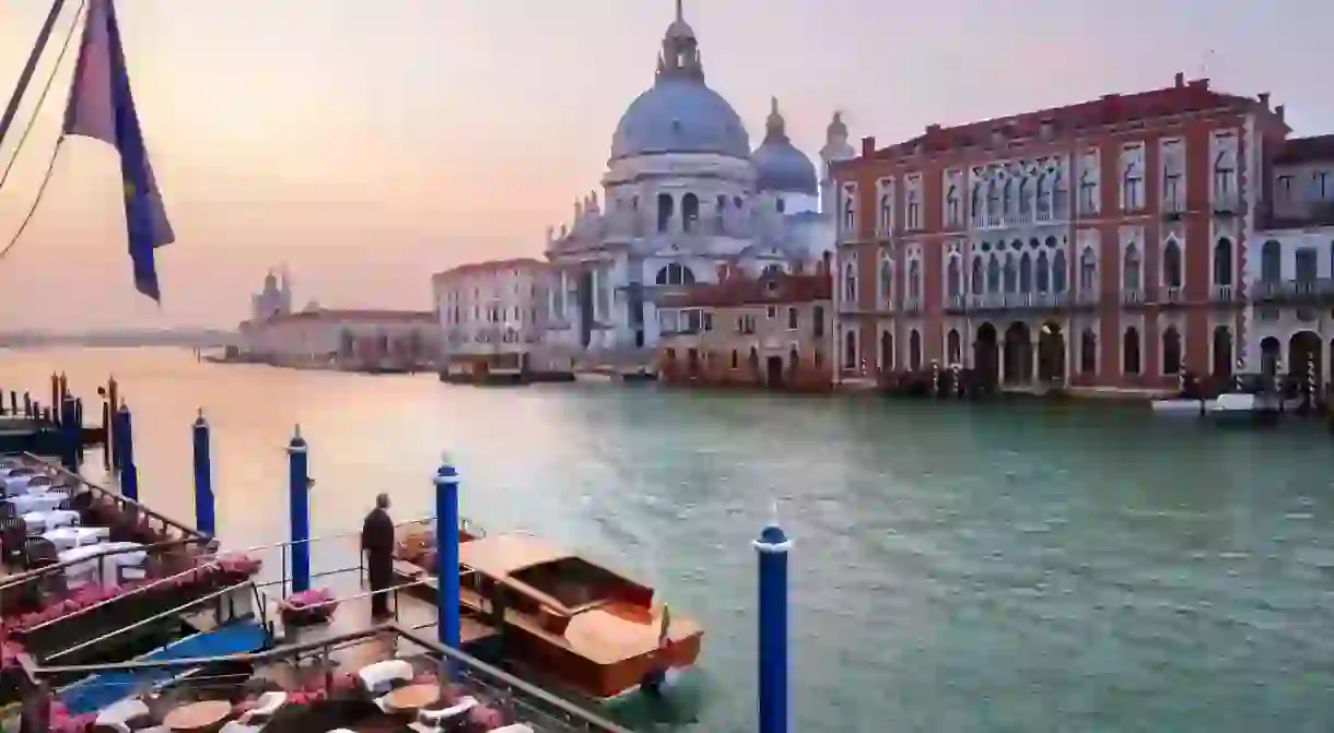 Book a luxury hotel room on this citys famous waterfront to experience Venetian opulence in full