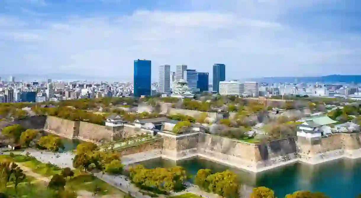 Osakas skyline merges the old world of Osaka Castle with modern skyscrapers