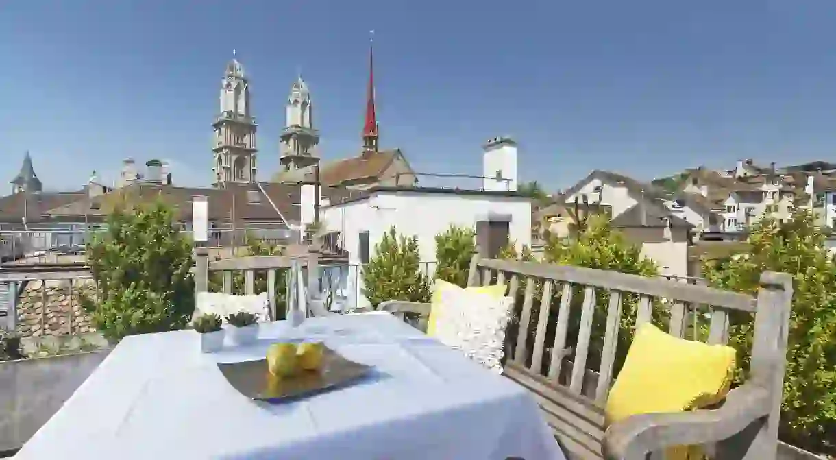 The rooftop terrace at Hotel Rössli offers lovely views of the surrounding rooftops and Grossmünster in Zürich