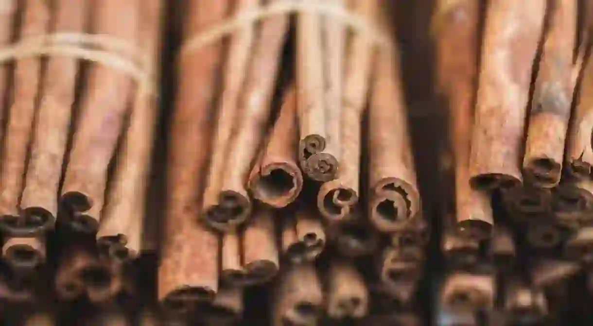 The best places to buy spices, such as cinnamon sticks, are the local markets