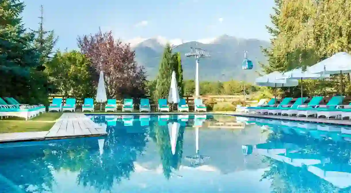 Opt for a refreshing dip in the pool or simply let nature revitalise you at the Kempinski Hotel Grand Arena in Bansko