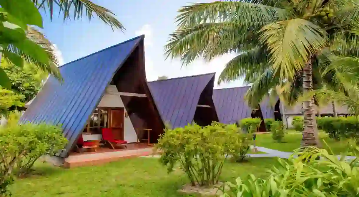 Stay at one of the charming A-frame chalets at La Digue Island Lodge in the Seychelles