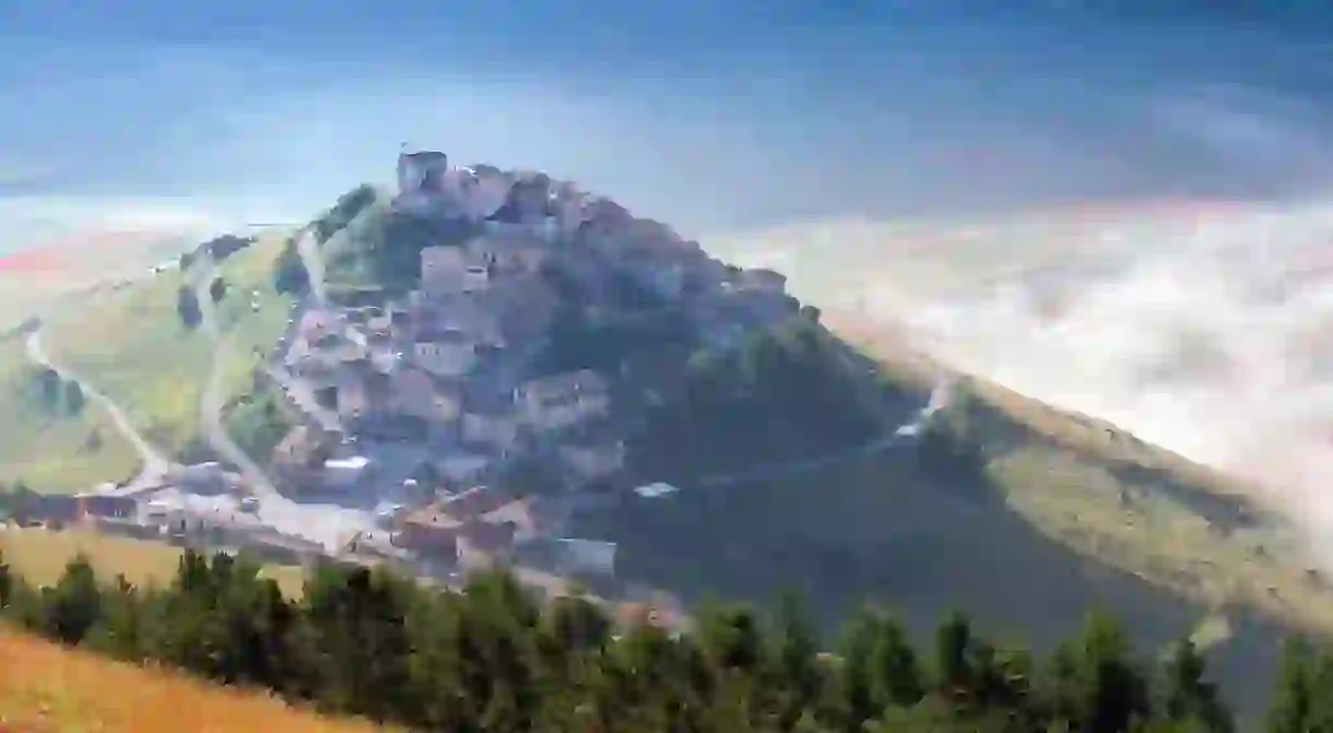 Sunrise over Castelluccio di Norcia, the Umbrian town famed for its food, history and picture-postcard looks