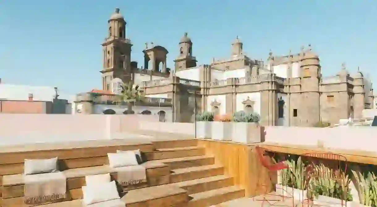 The rooftop pool at Veintiuno Emblematic Hotel offers stunning views over Las Palmas