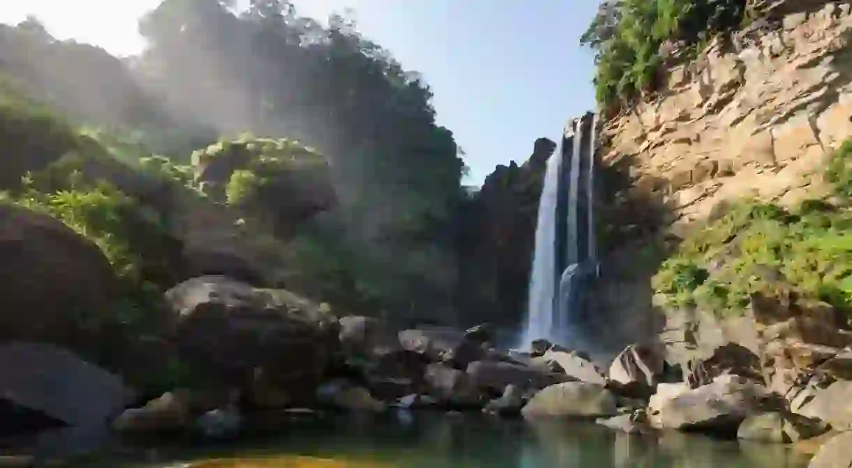 As beautiful as it is useful, Laxapana Falls doubles as a local power source