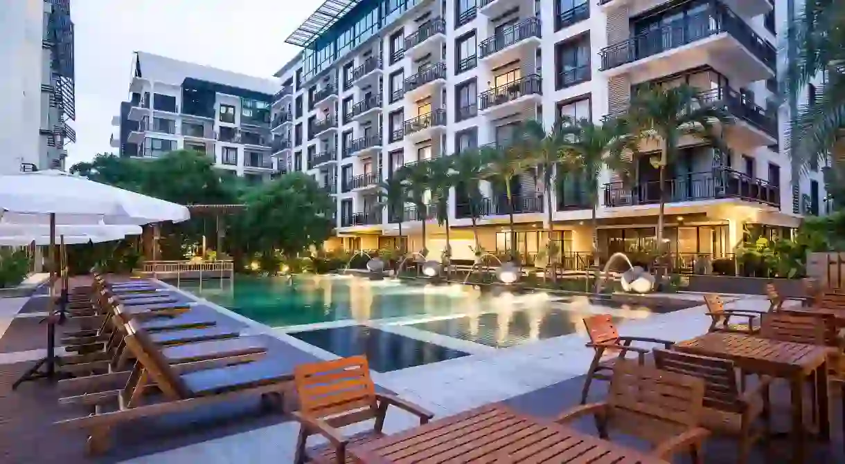 Enjoy a relaxing swim in the pool at the Amanta Hotel & Residence Ratchada