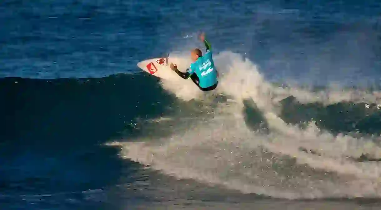 Pro surfer Kelly Slater wears Australian brand Billabong during a competition in 2008