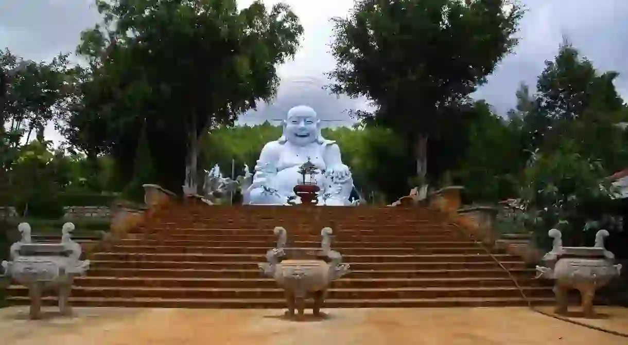 The Happy Buddha statue sits at the core of the Linh An Tu pagoda near Dalat