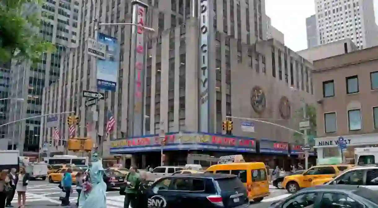 Inside Radio City Music Hall youll find an interior featuring art deco ornaments and fixtures