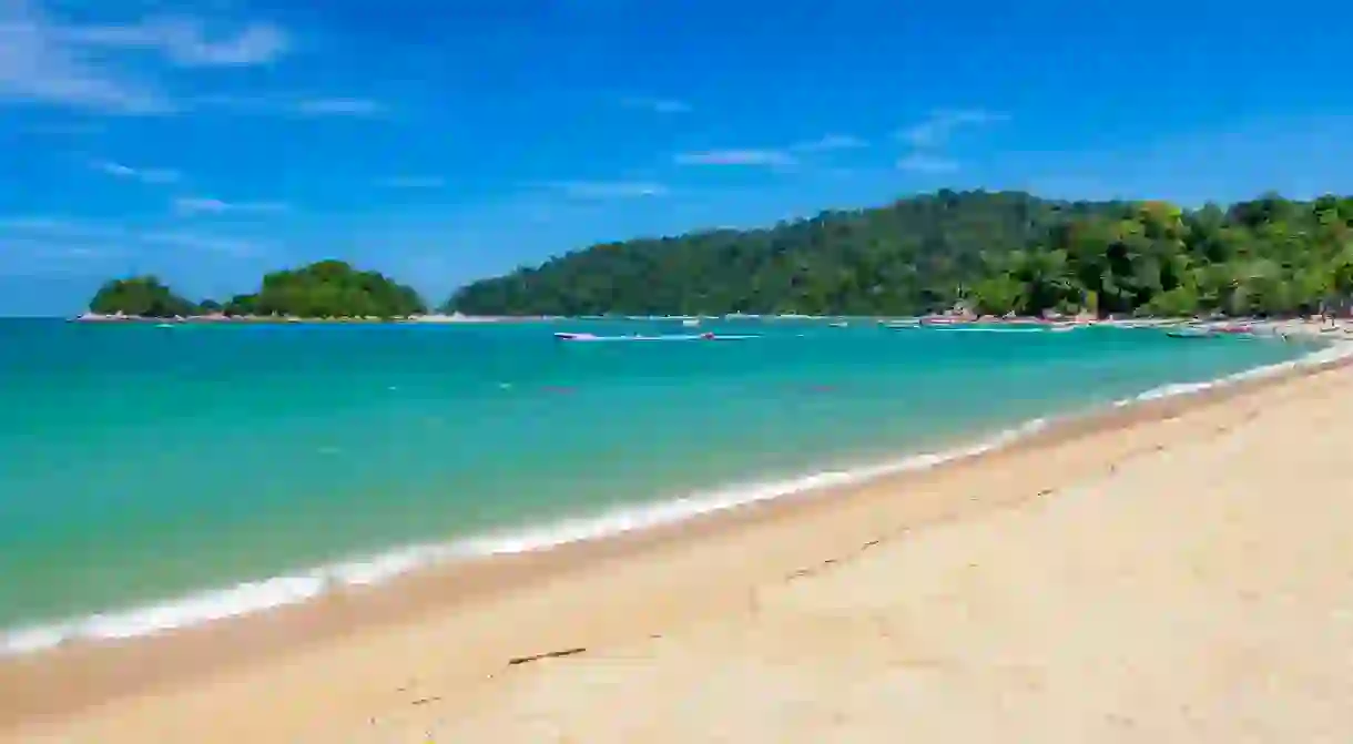 Relax on beautiful Teluk Nipah Beach on Pangkor Island, Perak, Malaysia