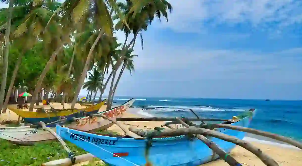 Fishermens boats are ubiquitous throughout the area around Bentota Beach