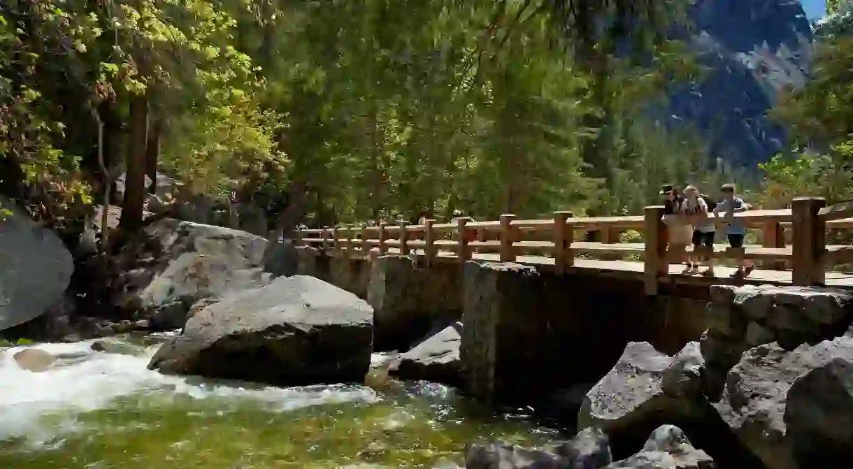 Footbridge across Merced River, on The Mist Trail, Yosemite National Park, California