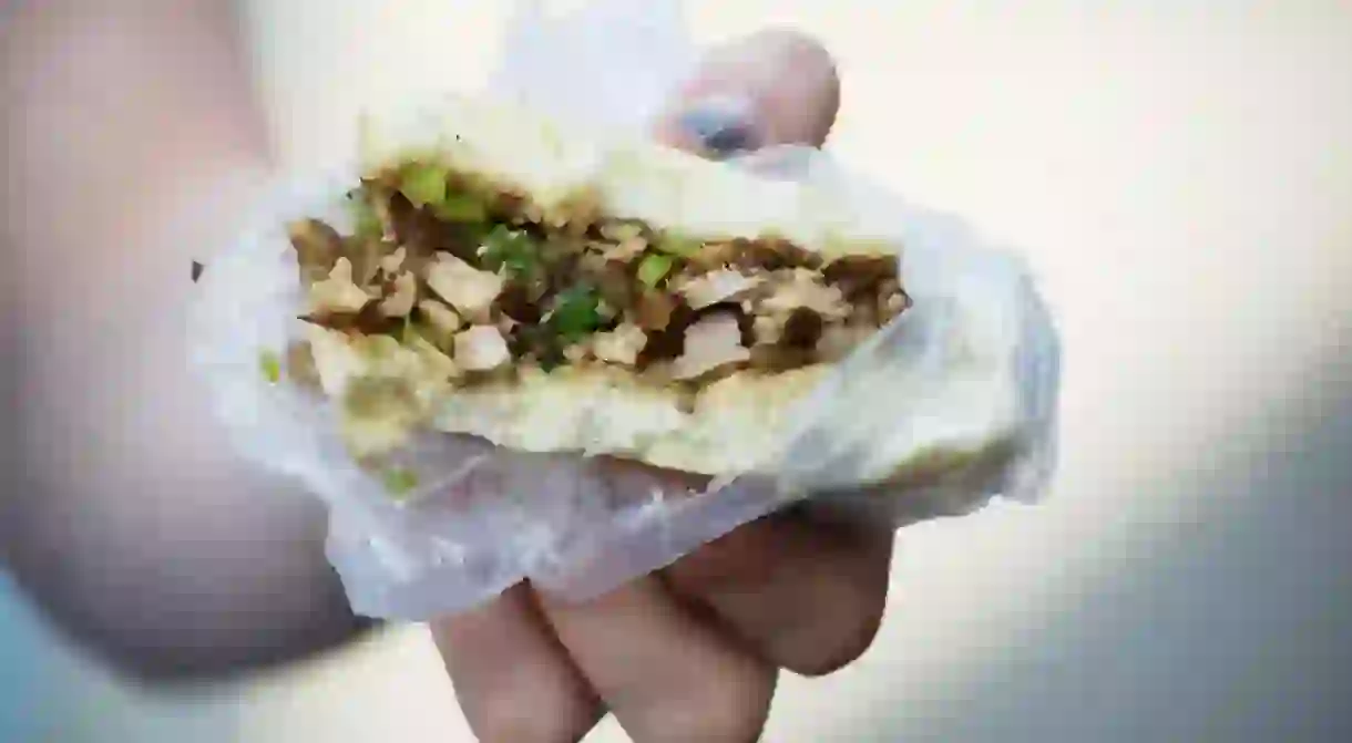 Make sure to try a delicious Rou jia mo, a traditional Uyghur meat sandwich