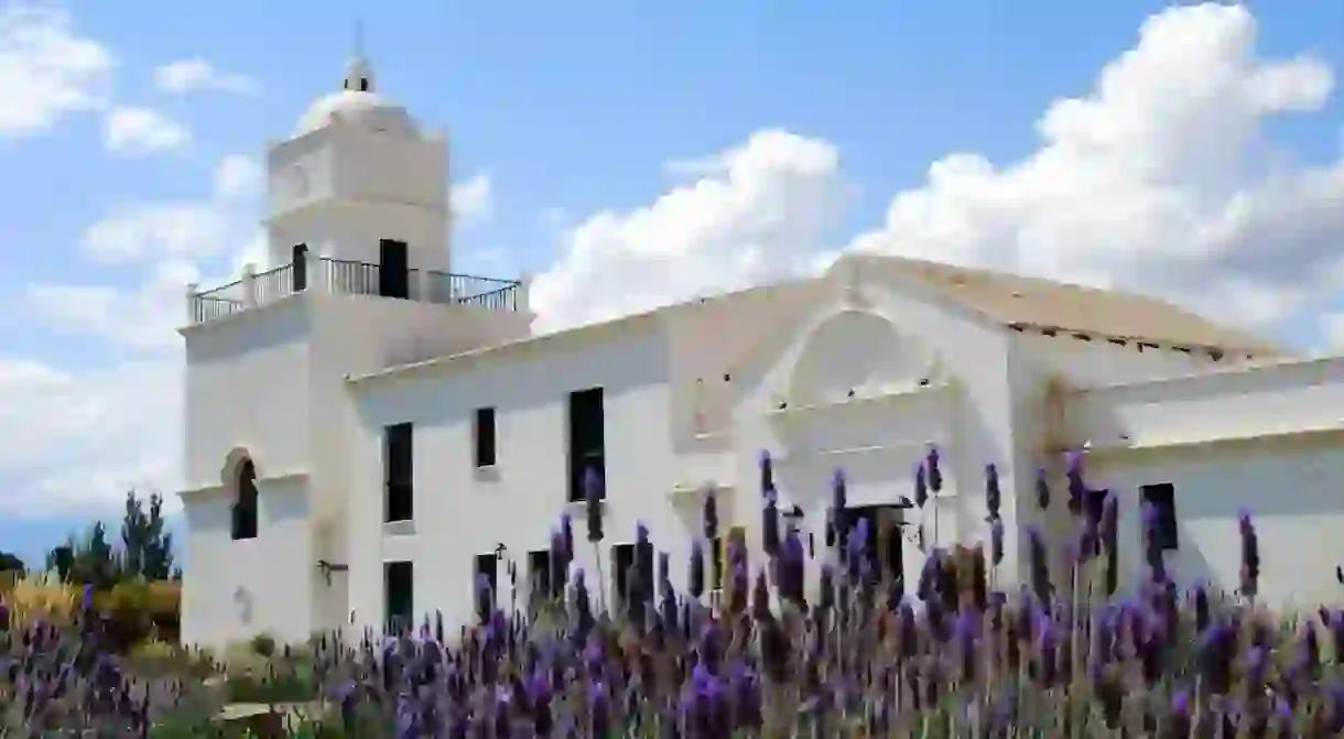 Dramatic La Merced del Alto stands in whitewashed isolation in a picturesque valley