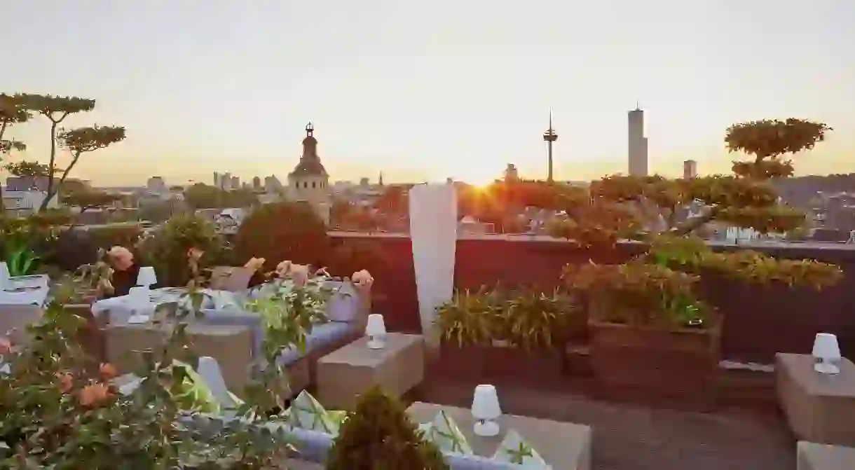 Enjoy the sunset from the rooftop terrace at the Savoy in Cologne, Germany