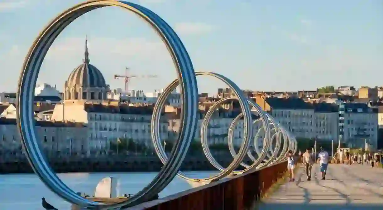 T7PFRA France, Loire Atlantique, Nantes, Ile de Nantes, Quai des Antilles, the rings of Buren on the banks of the Loire