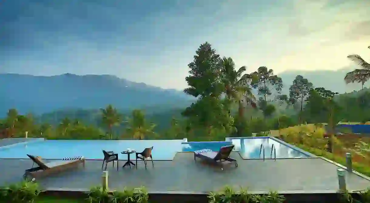 The Leaf Munnar hotel infinity pool offers a relaxing spot to soak up verdant scenery