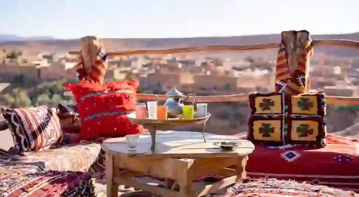 Drinking a glass of mint tea on a rooftop terrace is a quintessential Morocco experience