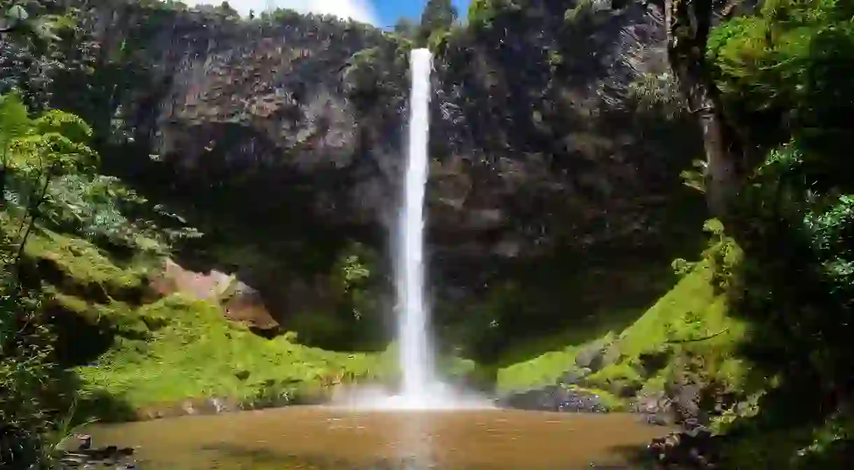 Stop for a visit to the infamous Bridal Veil Falls in New Zealands bohemian town of Raglan