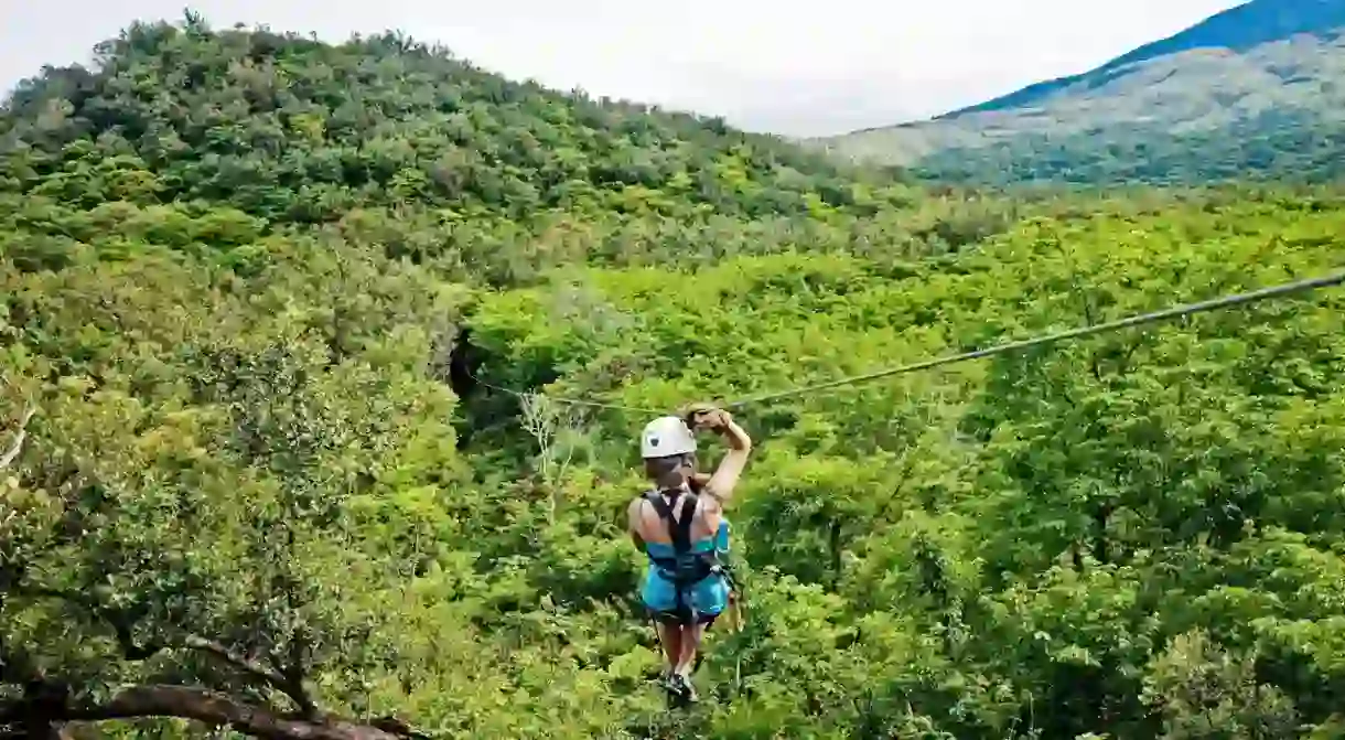 Zip across the emerald canopy of Rincon de la Vieja National Park