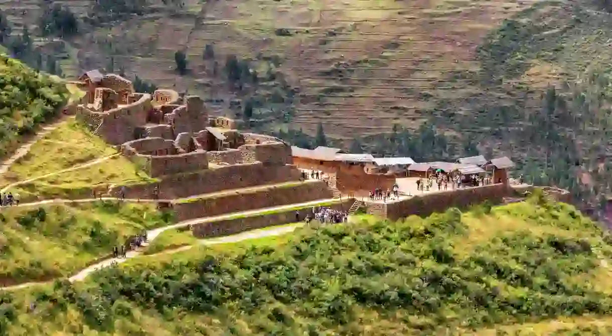 Pisac, one of the first towns on the Sacred Valley route, is home to mountainside crop terraces