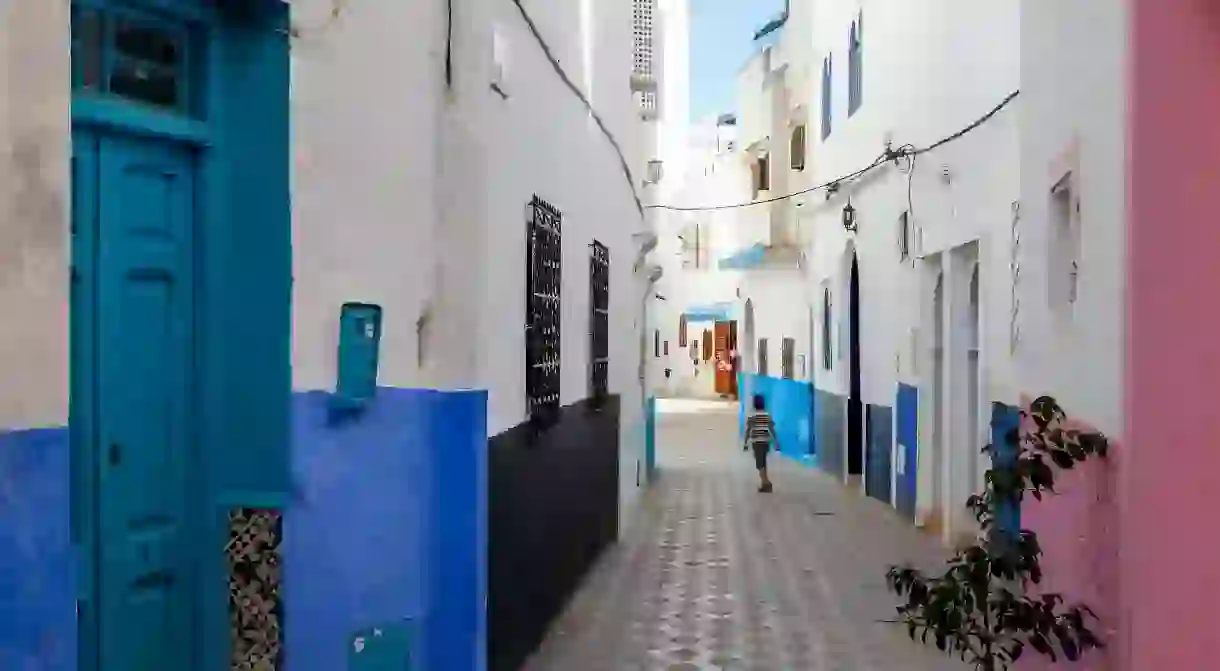 The colourful streets of Asilahs old town blend Moroccan and Andalusian aesthetics