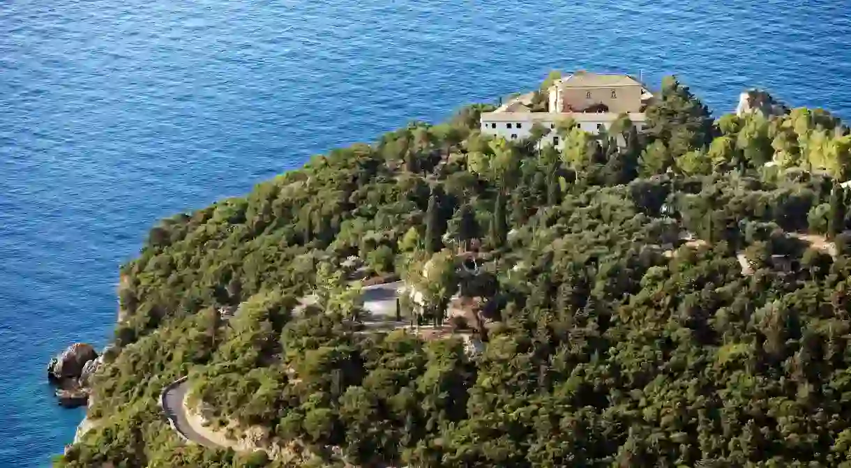 The Monastery of Paleokastritsa sits on a forested hill in Corfu