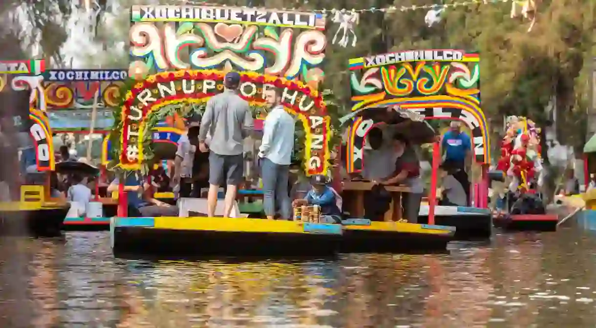 The colorful, flat-bottomed boats known as trajineras are the perfect way to tour Xochimilco