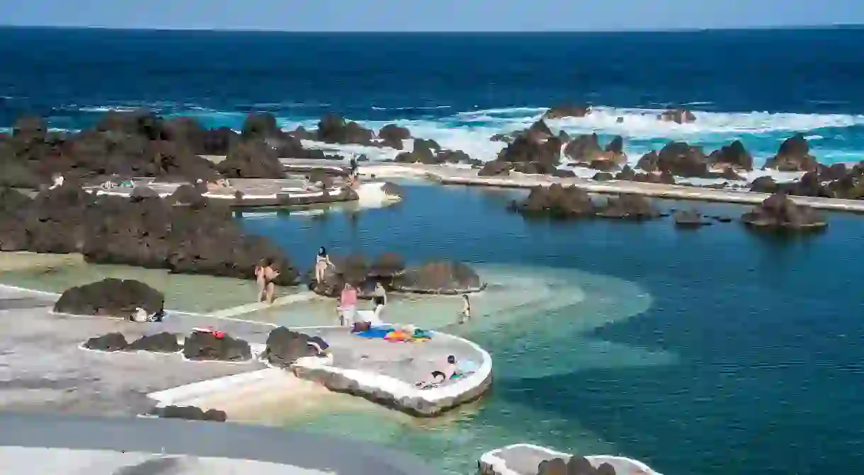 Cool off from the summer sun with a dip in the natural pools at Porto Moniz