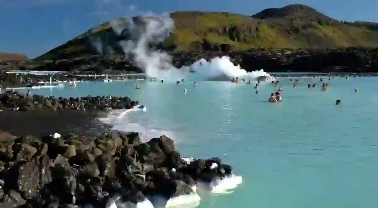 Bathe in the warm milky-blue geothermal waters of the Blue Lagoon, Iceland, whatever the weather