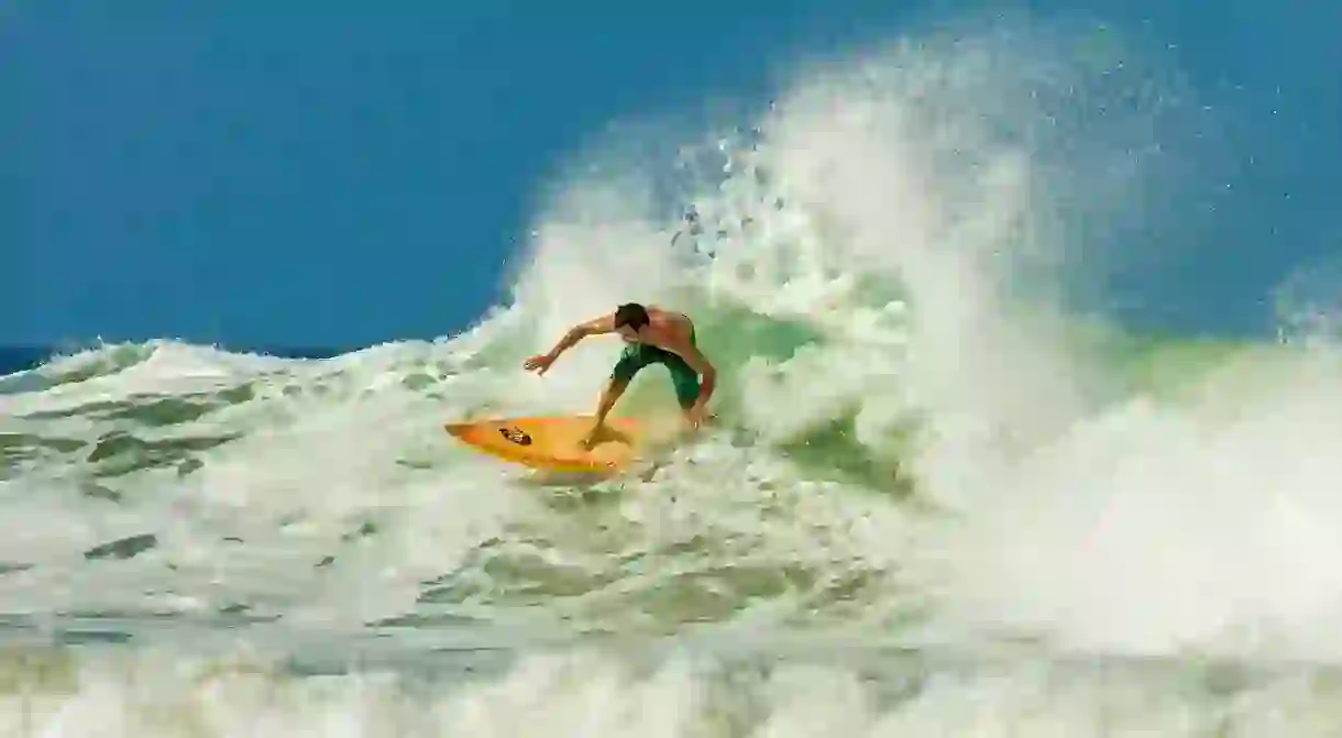 Ride the waves at Playa Guiones in Nosara, Costa Rica