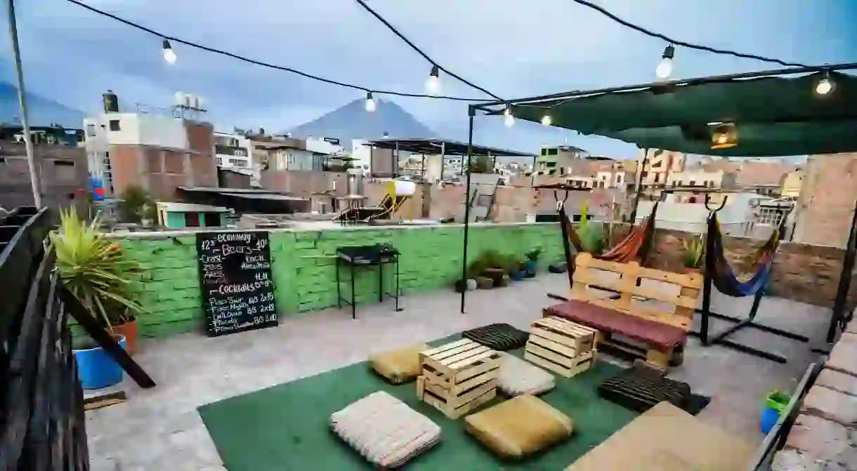 Head to the rooftop at hostel Econunay for city and volcano views