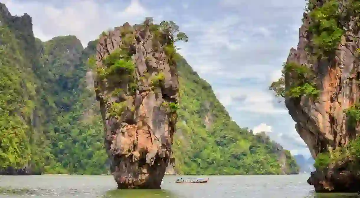 Cruise beside the karst towers of James Bond Island, in Ao Phang Nga National Park