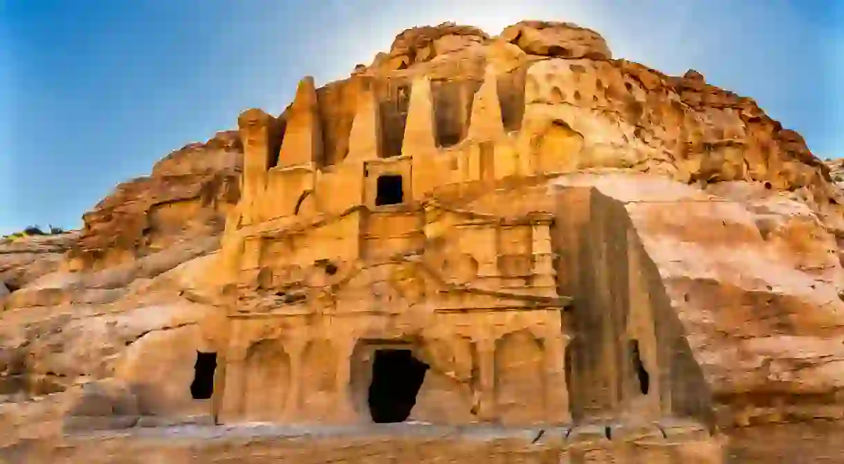 An ancient city carved into sandstone mountains, Petra offers the chance to hike through ruins and absorb ancient history