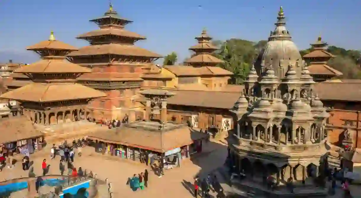 Marvel at ancient palaces, temples and shrines in Patan Durbar Square, Kathmandu, Nepal