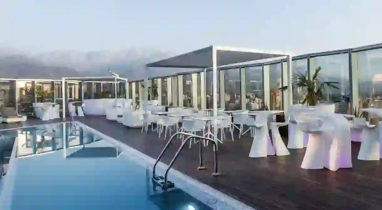 Take in the Santiago skyline from the rooftop pool at ICON Hotel