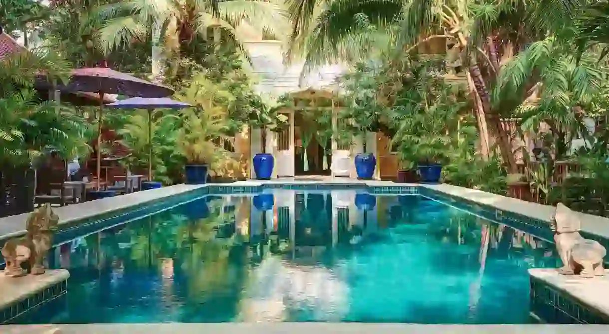 Relax poolside at the Pavilion in Phnom Penh