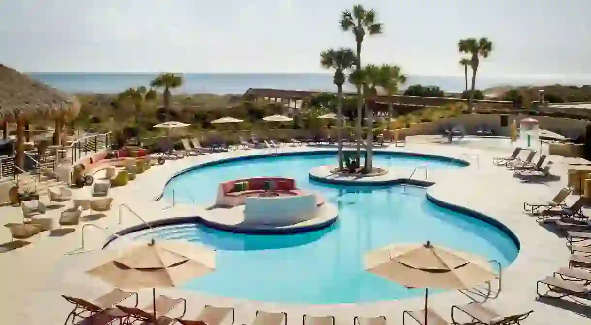 Plonk yourself on a pool-side sun lounger at the Ritz-Carlton for a chilled out afternoon on Amelia Island