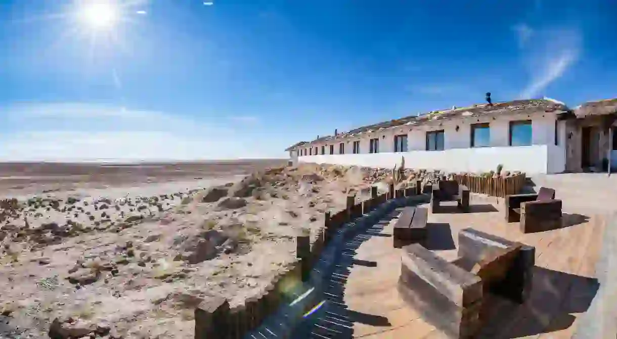 Look out over the largest salt flat in the world from Hotel de Sal Luna Salada in Uyuni