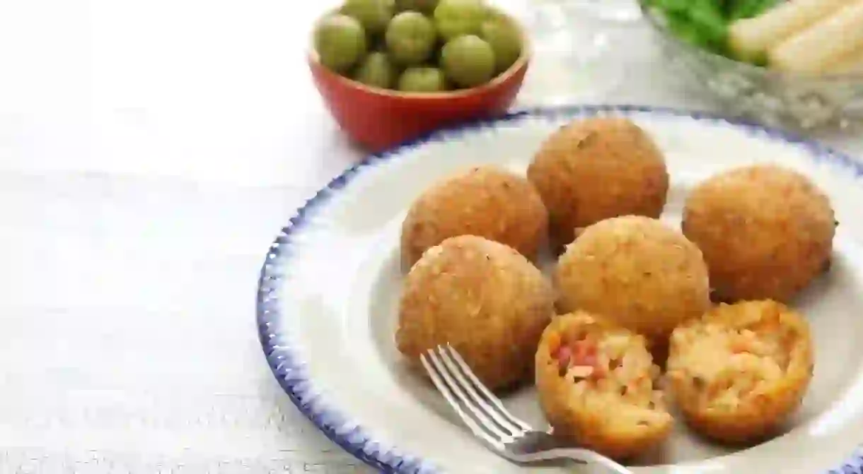 First cooked up in the 10th century, arancini are now a staple of Sicilian street food