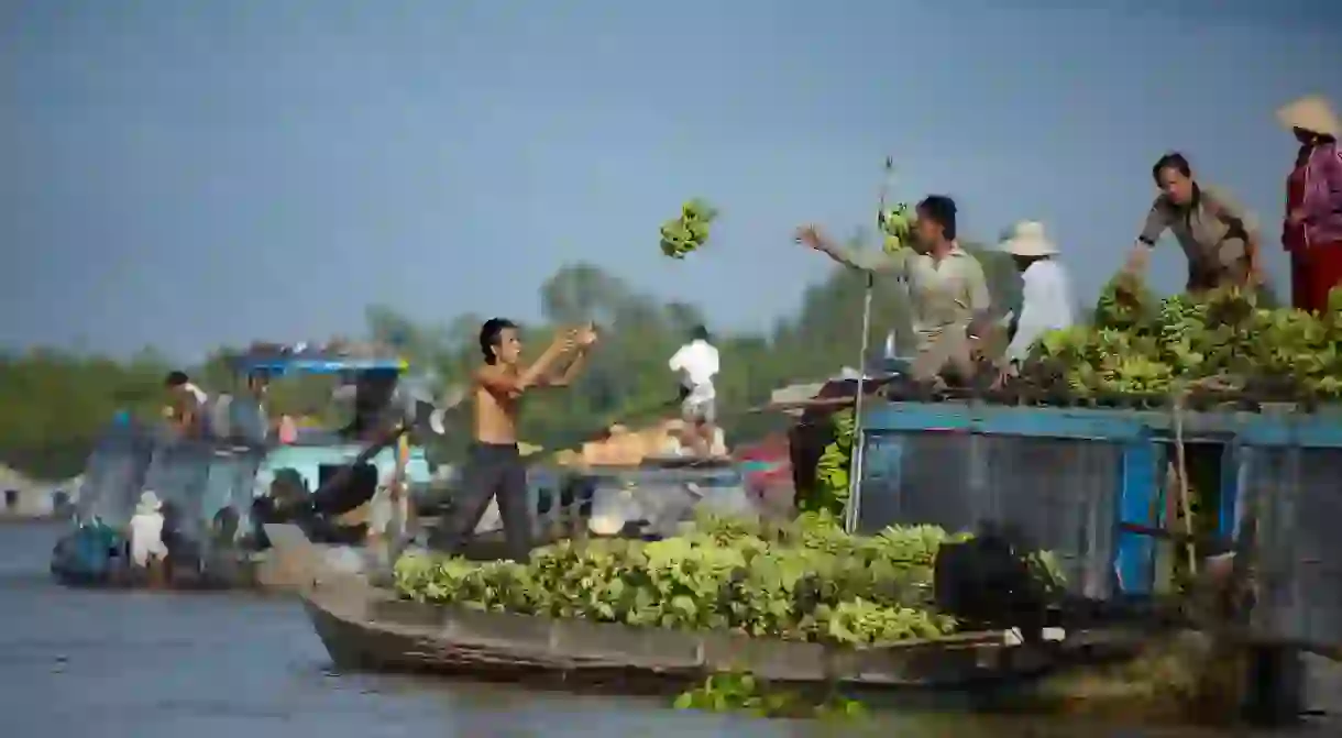 Trading bananas at a floating market in Cau Doc, on the Mekong Delta