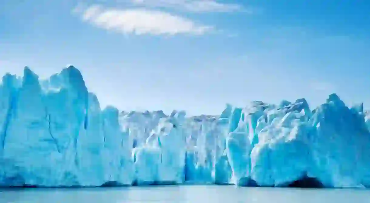 The Glacier Grey tumbles down into Lago Grey in the Torres del Paine National Park