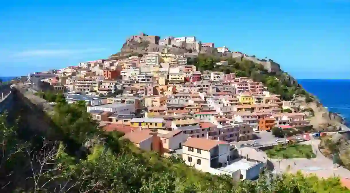 For a multi-coloured hill village with a castle on top, head to Castelsardo on the northwest coast of Sardinia