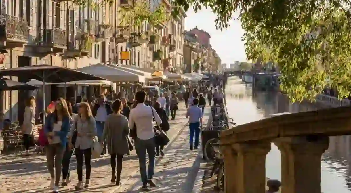 Join the bustle alongside the Naviglio Grande while in Milan