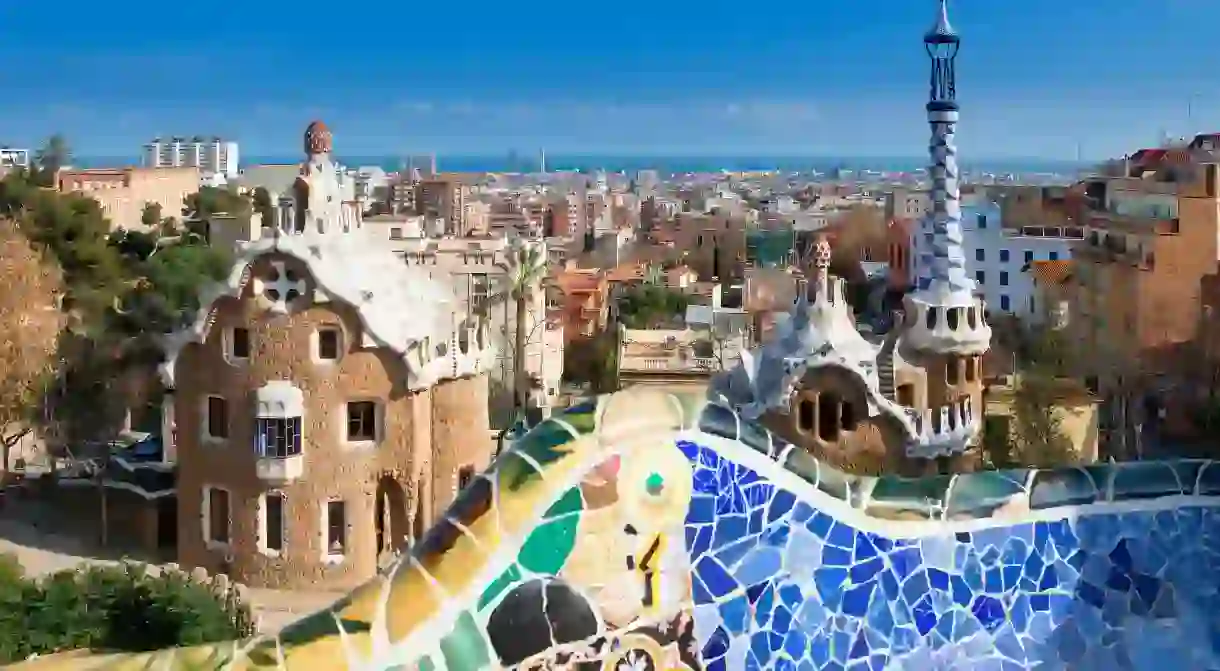 Book into an affordable hostel and save more of your budget for exploring Barcelona, seen here from Park Güell