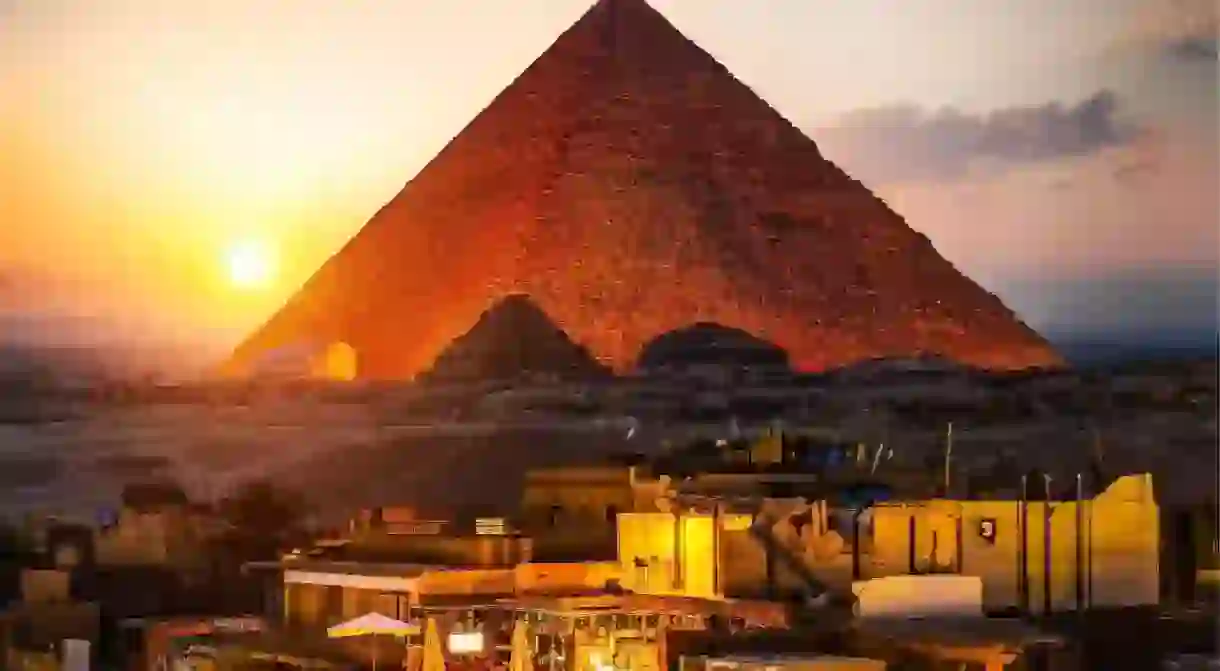 The Great Pyramid is particularly beautiful as dusk falls on Giza